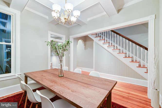 1319 T Street Northwest Washington, DC 20009 - Photo 4 of 25 a view of a dining room with furniture and a chandelier