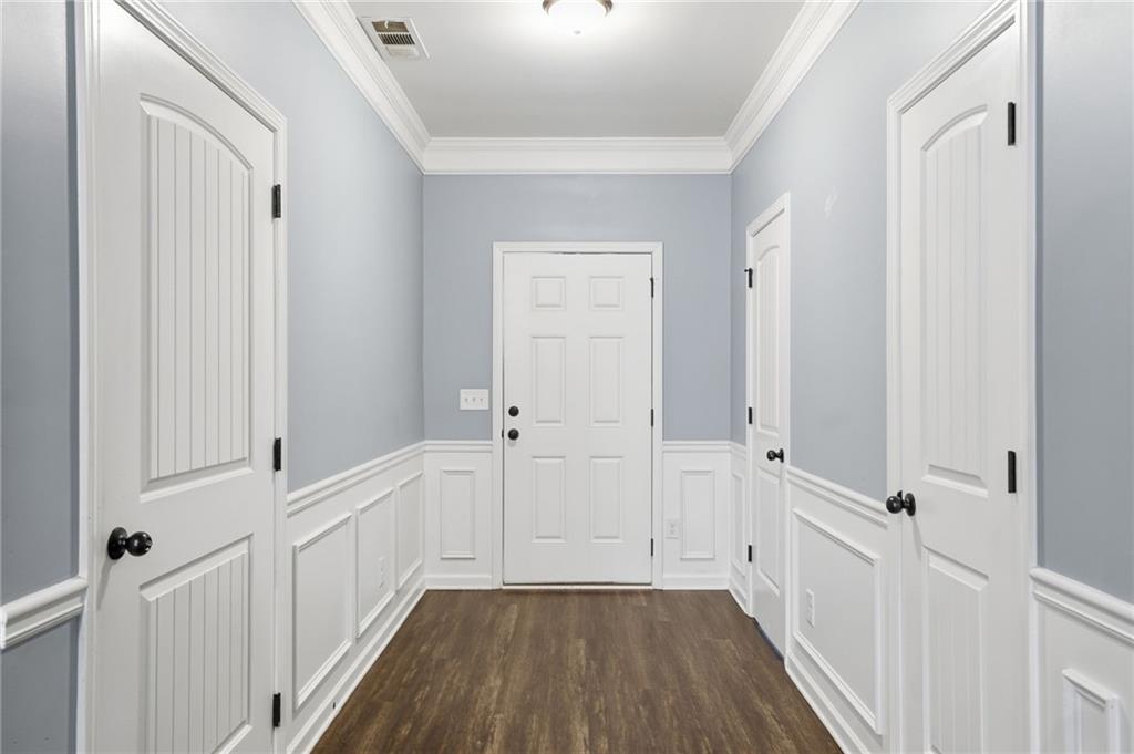 112 Spring Way Square Canton, GA 30114 - Photo 11 of 41 a view of a hallway with wooden floor