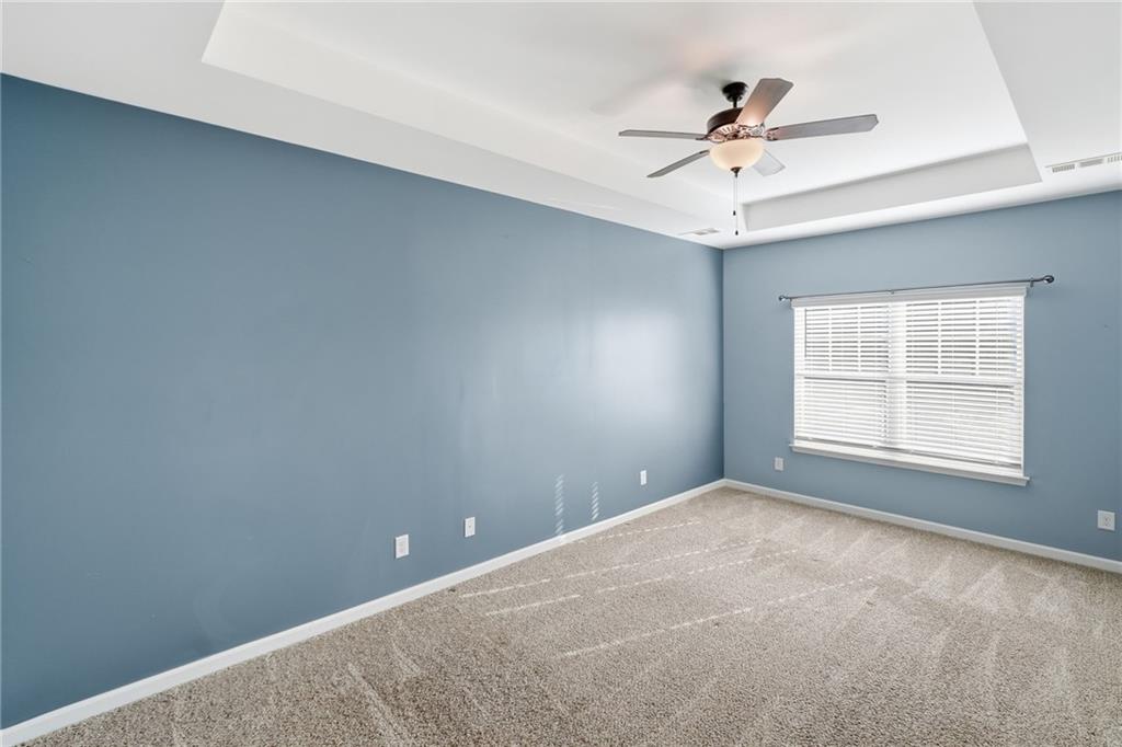 112 Spring Way Square Canton, GA 30114 - Photo 18 of 41 a view of an empty room with a window