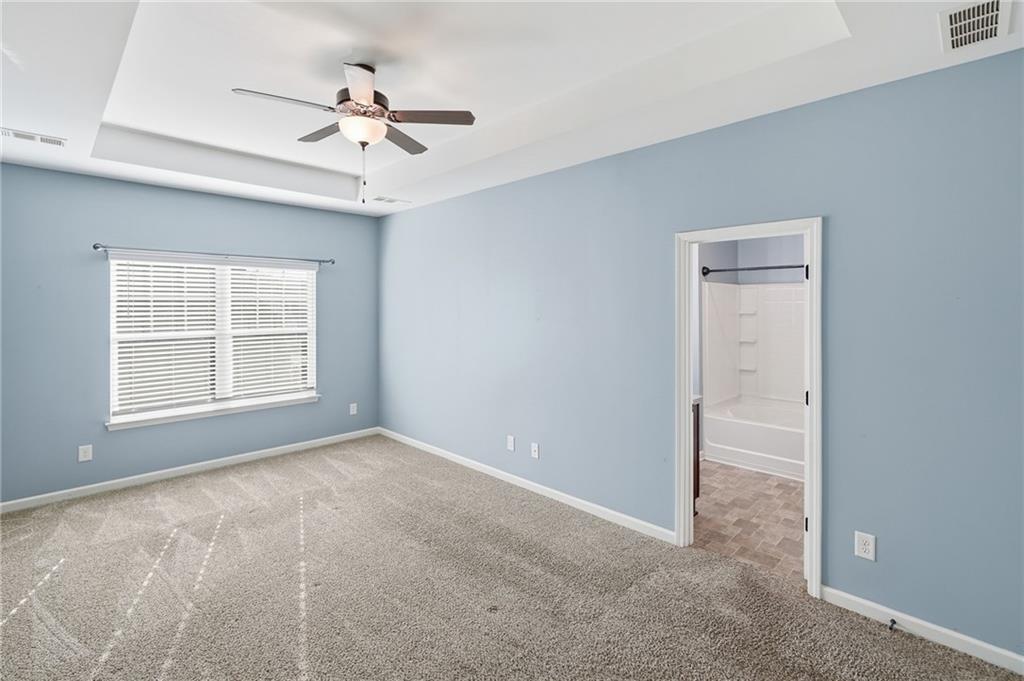 112 Spring Way Square Canton, GA 30114 - Photo 19 of 41 a view of an empty room with a window