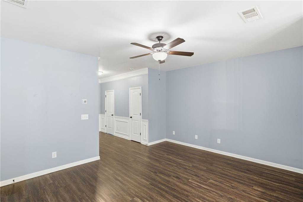 112 Spring Way Square Canton, GA 30114 - Photo 8 of 41 a view of empty room with wooden floor