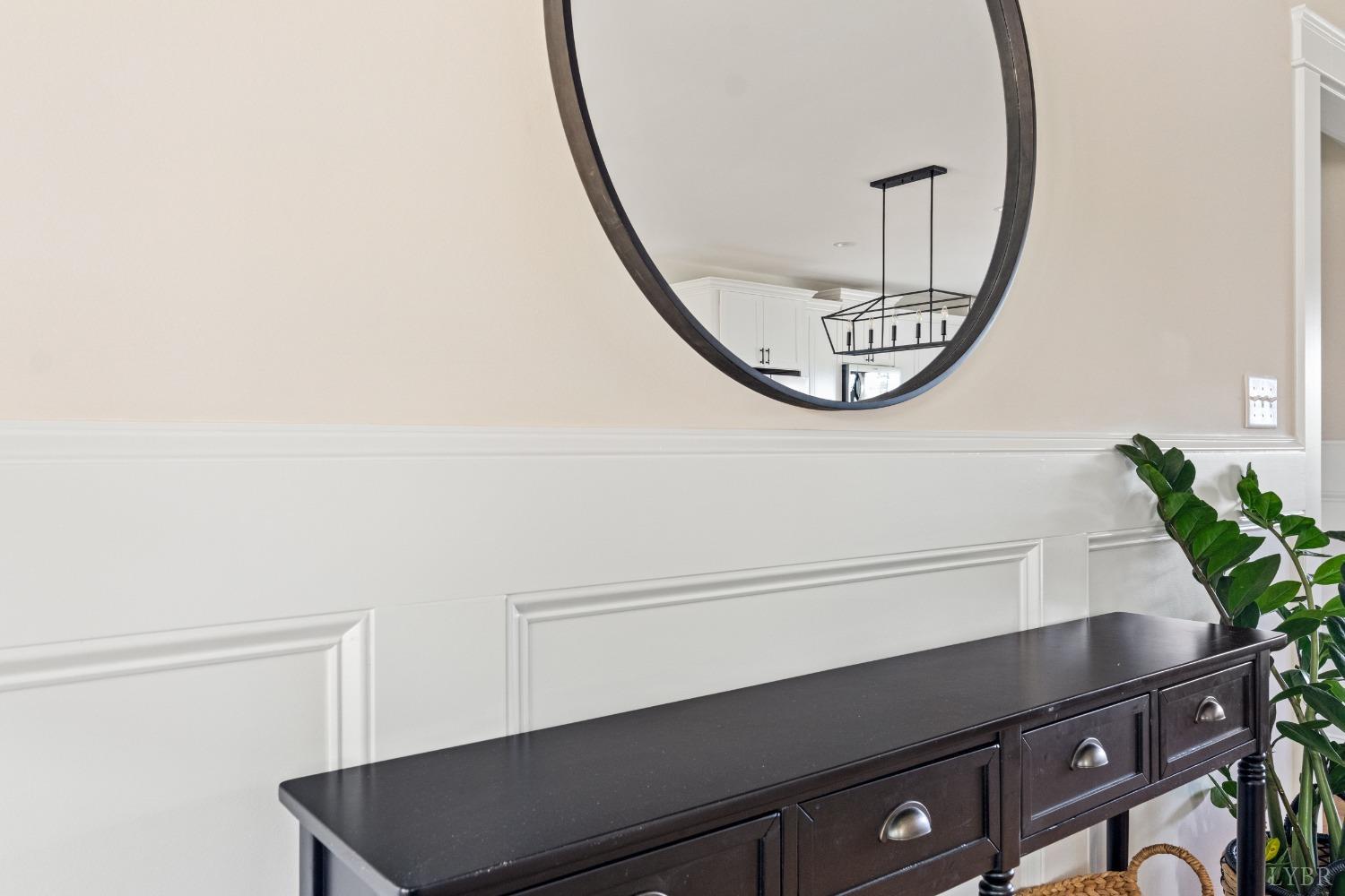 6605 Forest Road Goode, VA 24556 - Photo 16 of 58 a view of a hallway with paintings on the wall