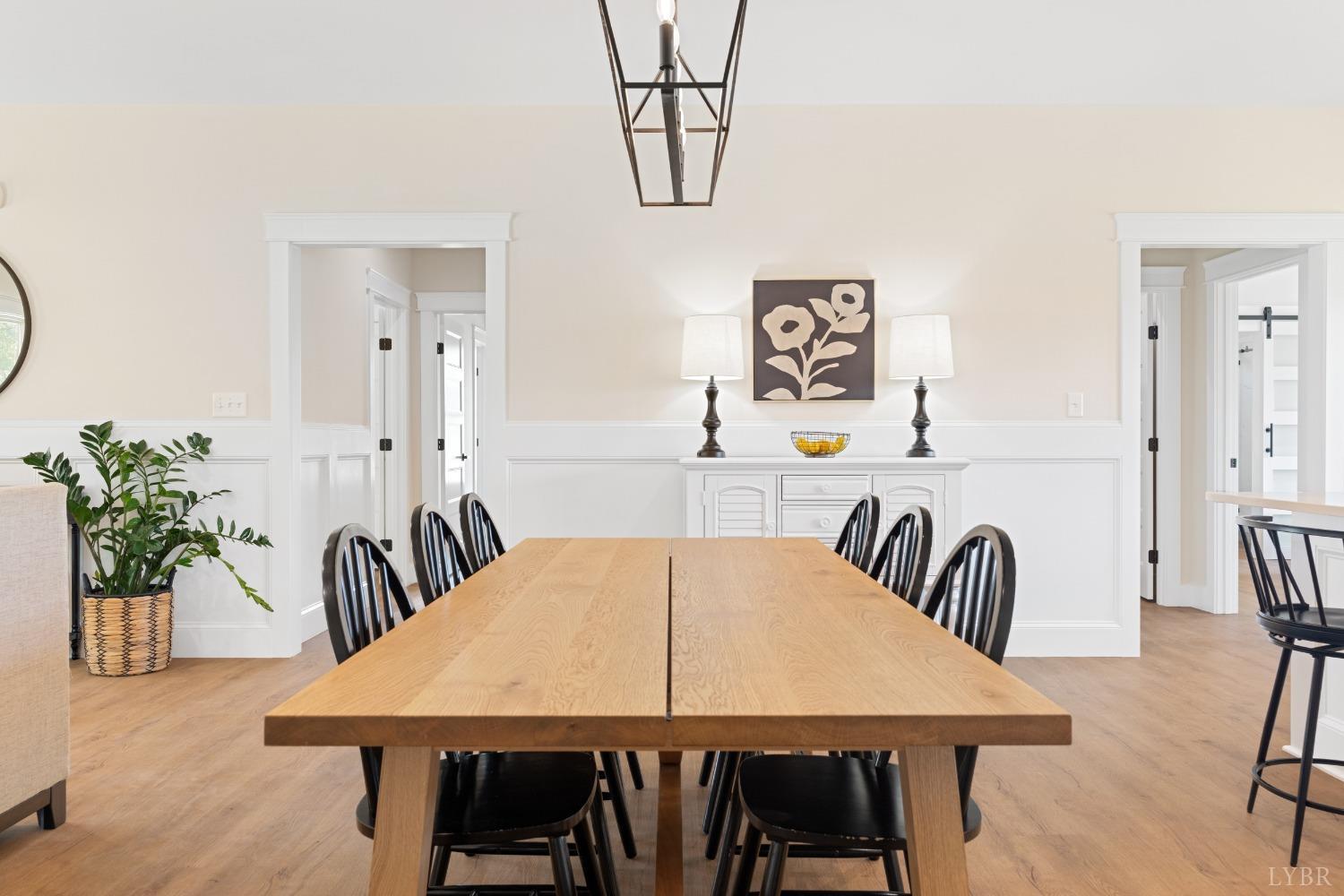 6605 Forest Road Goode, VA 24556 - Photo 21 of 58 a view of a dining room with furniture and a table