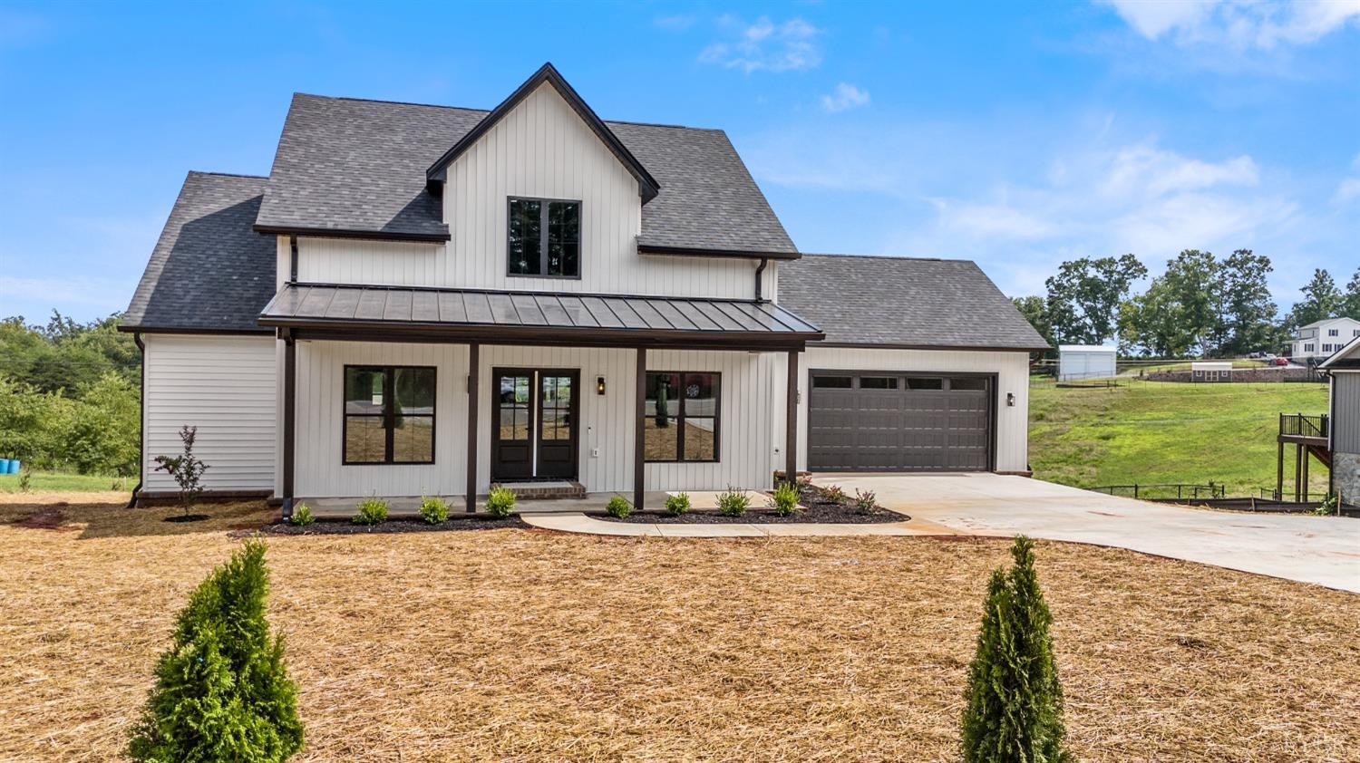 6605 Forest Road Goode, VA 24556 - Photo 3 of 58 a front view of a house with a yard
