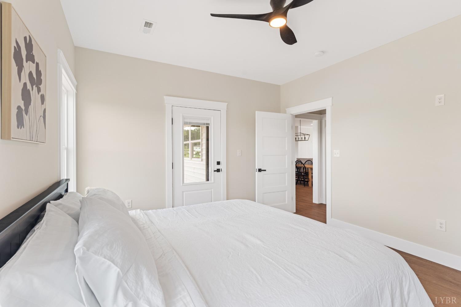 6605 Forest Road Goode, VA 24556 - Photo 39 of 58 a bedroom with a bed and cabinets