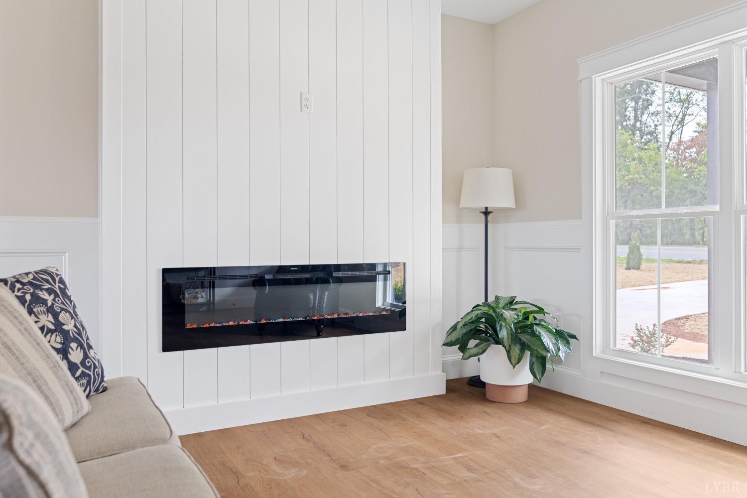 6605 Forest Road Goode, VA 24556 - Photo 46 of 58 a living room with furniture and a potted plant