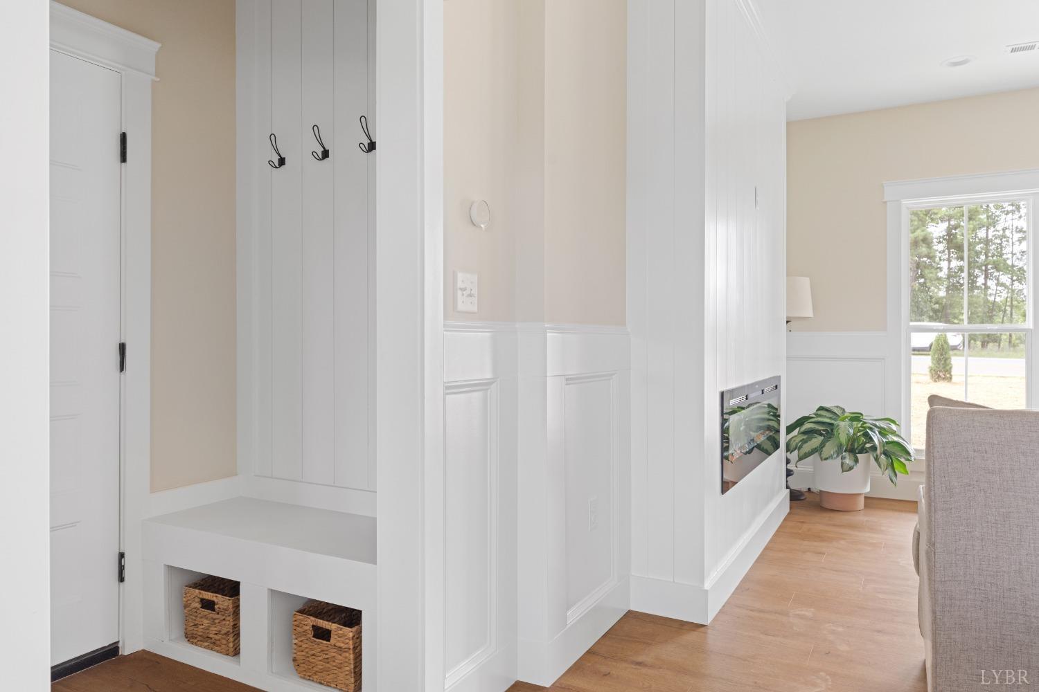6605 Forest Road Goode, VA 24556 - Photo 48 of 58 a view of a hallway with furniture and a potted plant