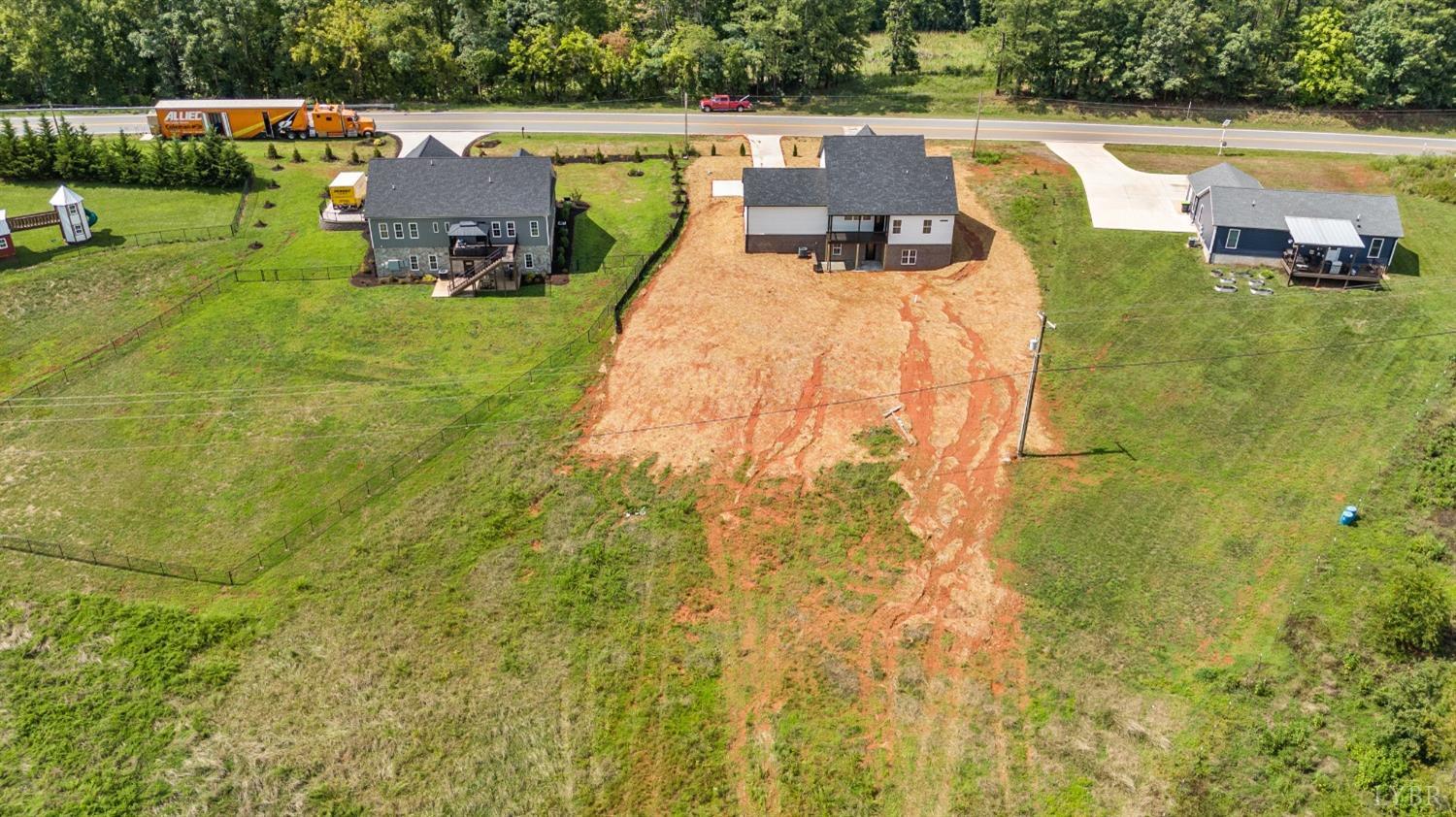 6605 Forest Road Goode, VA 24556 - Photo 6 of 58 a balcony with table and chairs