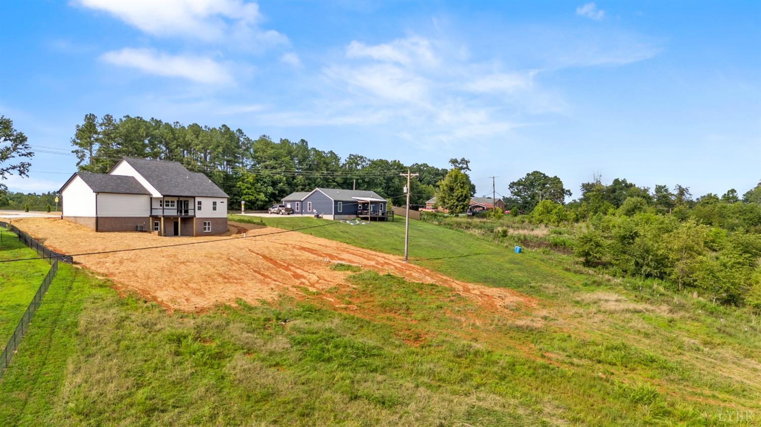 6605 Forest Road Goode, VA 24556 - Photo 8 of 58 a swimming pool with trees in the background