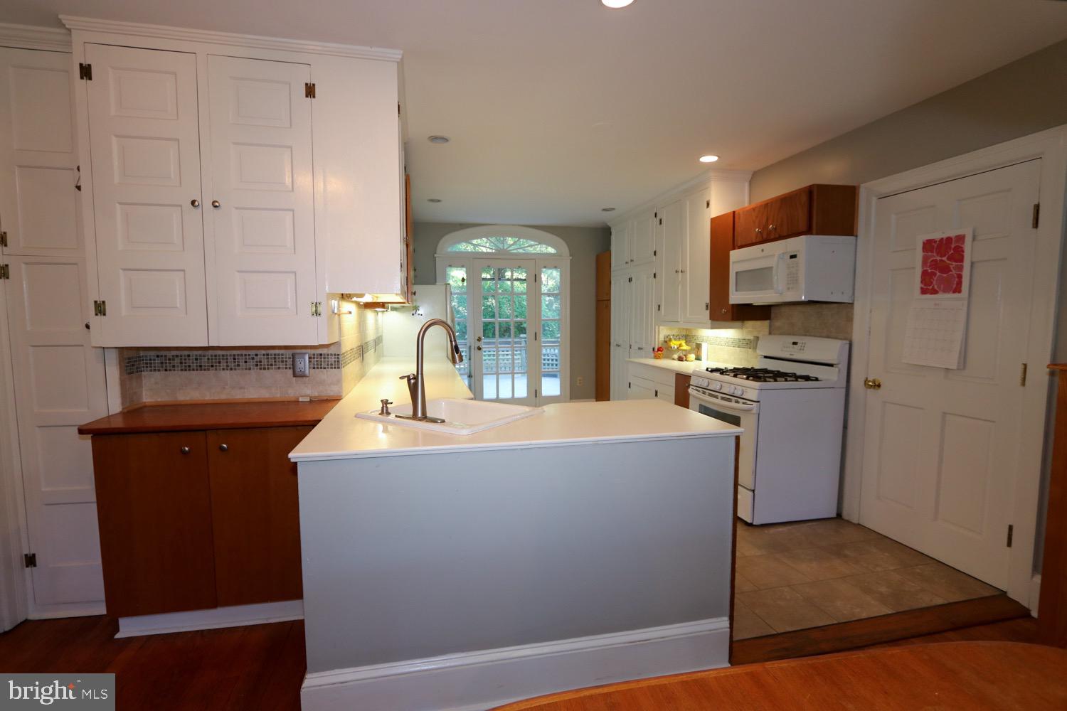 2701 Alden Road Bryn Athyn, PA 19006 - Photo 19 of 105 a kitchen with stainless steel appliances granite countertop a refrigerator a stove and a sink