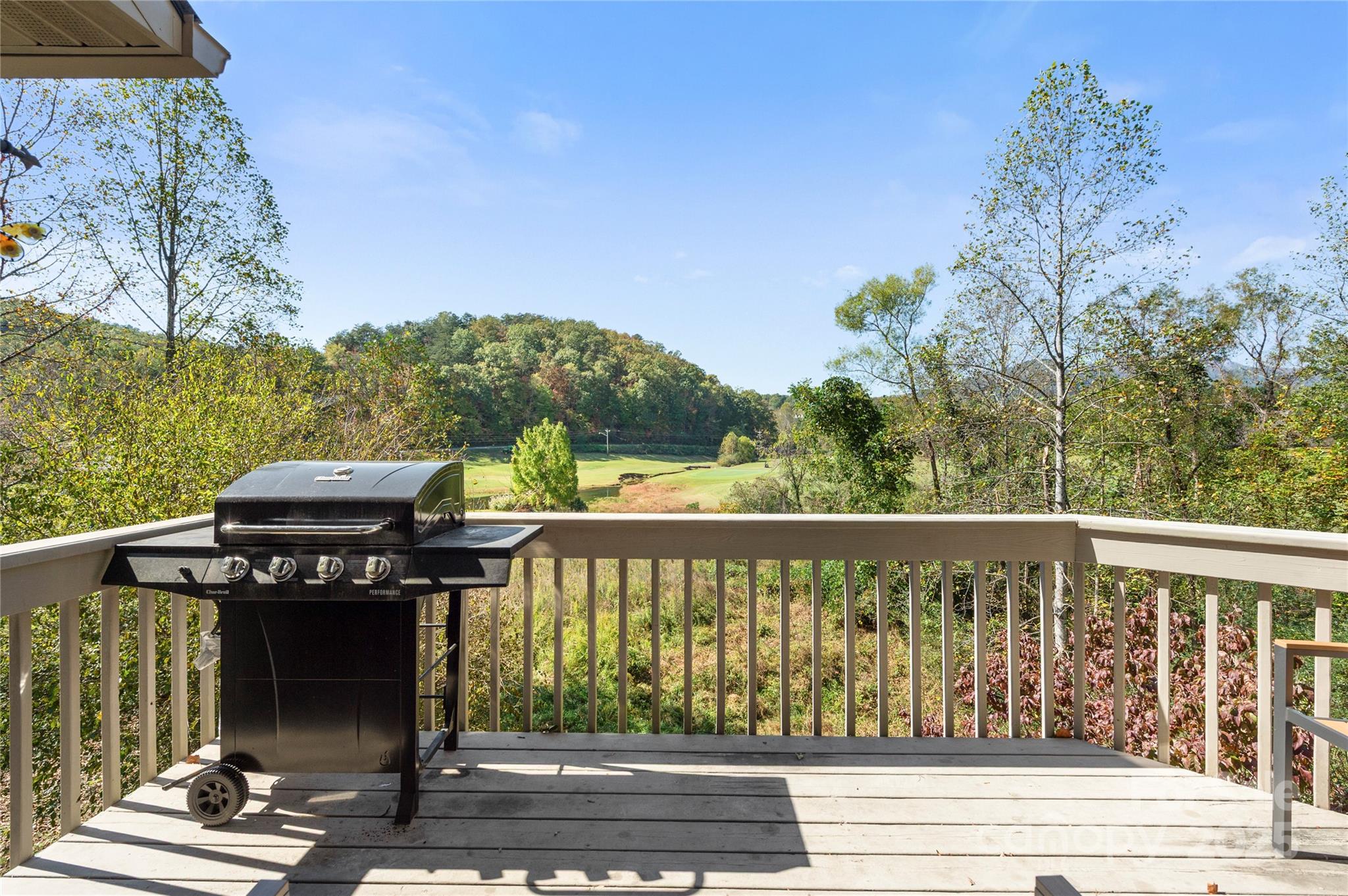 108 June Court Lake Lure, NC 28746 - Photo 13 of 46 a view of a street with sitting area