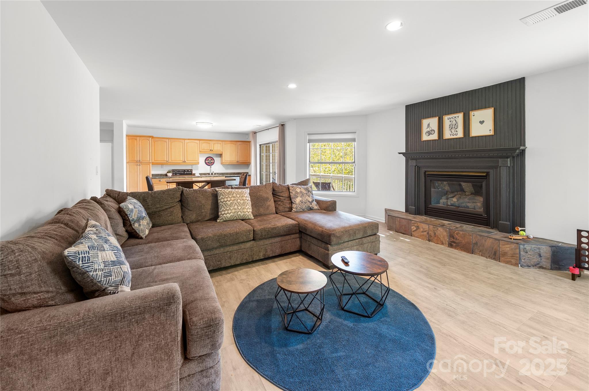 108 June Court Lake Lure, NC 28746 - Photo 26 of 46 a living room with furniture and a fireplace