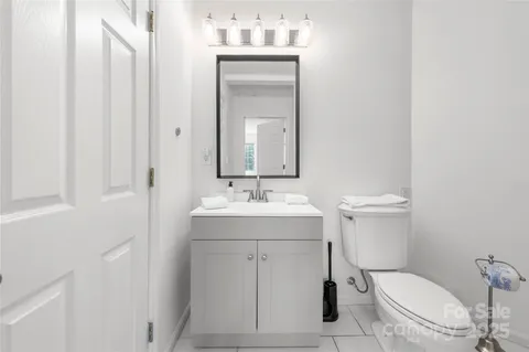 a view of a two chairs in the balcony