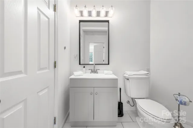 a view of a two chairs in the balcony