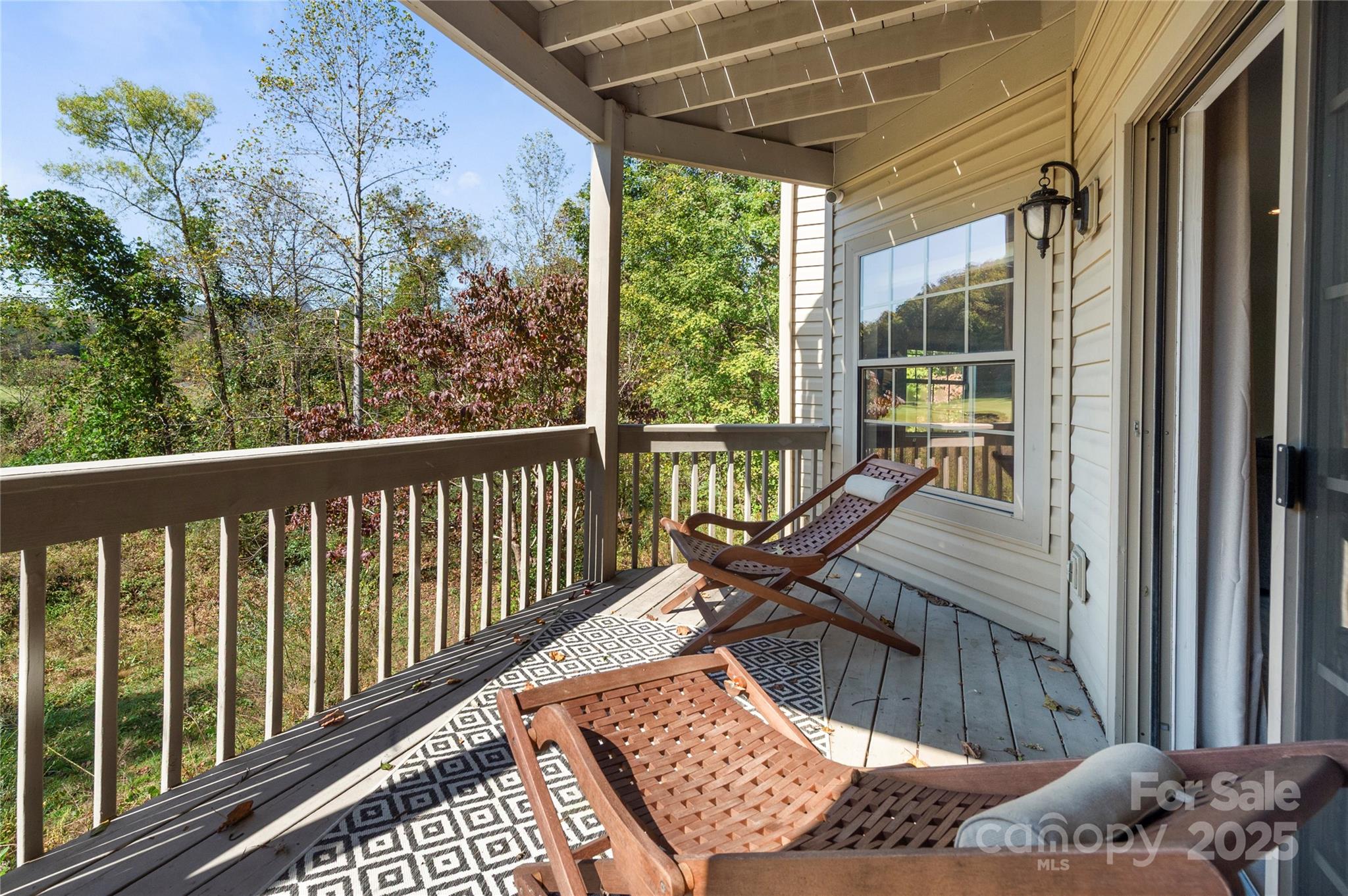 108 June Court Lake Lure, NC 28746 - Photo 30 of 46 a view of a two chairs in the balcony