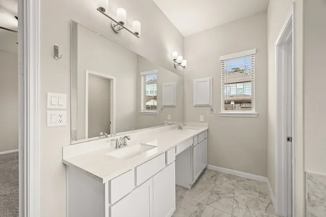 a view of an empty room with a windows