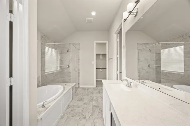 a view of a house with a yard and porch