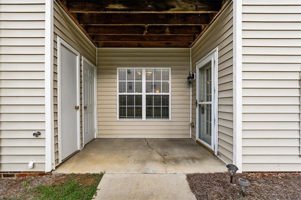 133 James Road, Unit IC High Point, NC 27265 - Photo 16 of 17 Exterior entrance with patio and storage closet.