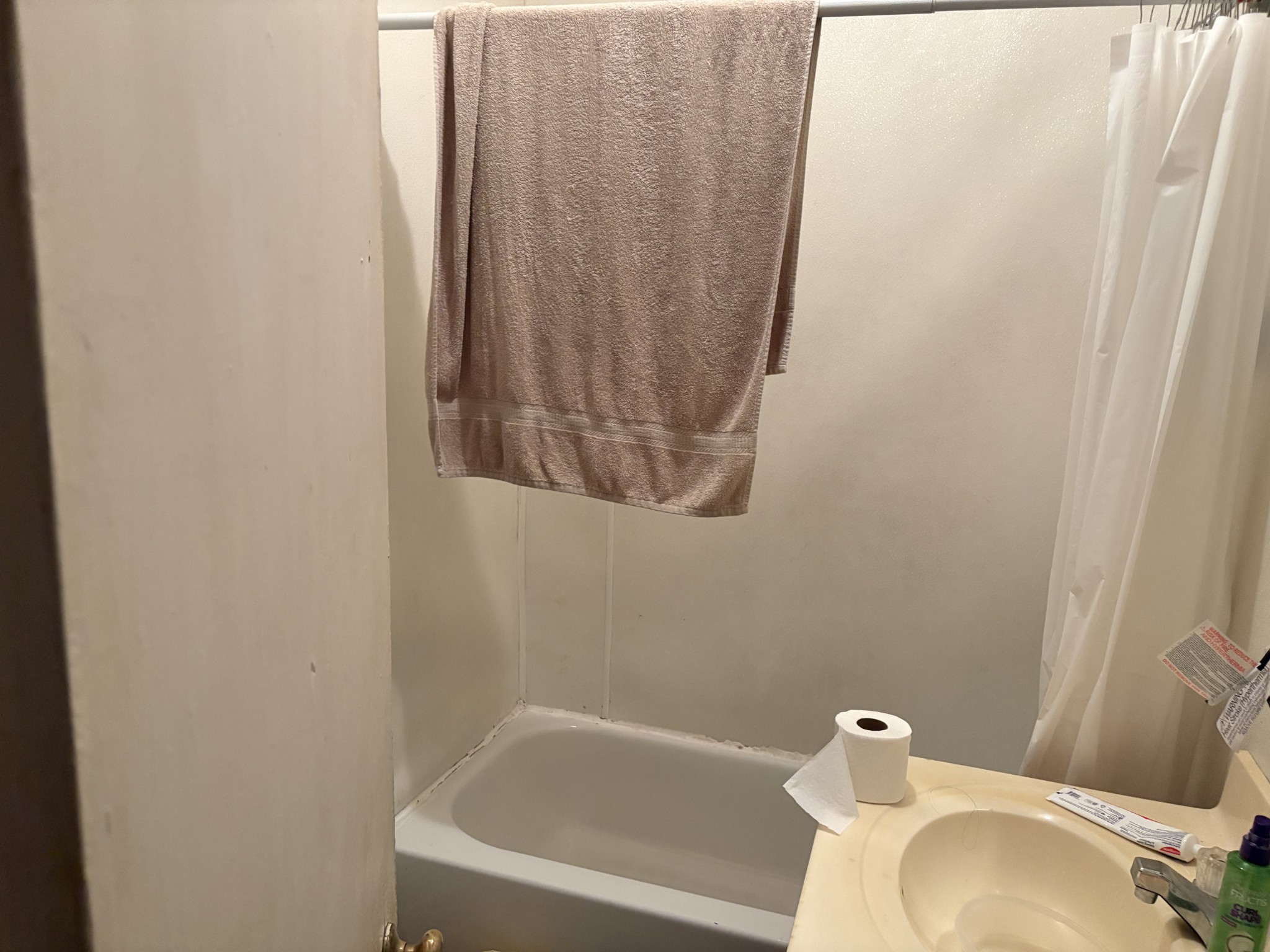 306 Jackson Street Smithville, TN 37166 - Photo 6 of 7 a bathroom with a sink and a toilet