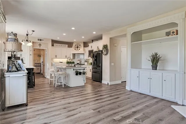 a kitchen with counter top space cabinets and stainless steel appliances