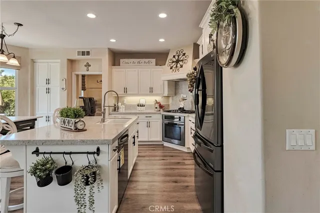 a view of kitchen dining table and chairs