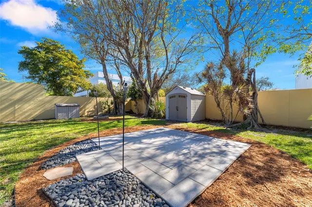 a view of outdoor space with playground and green space