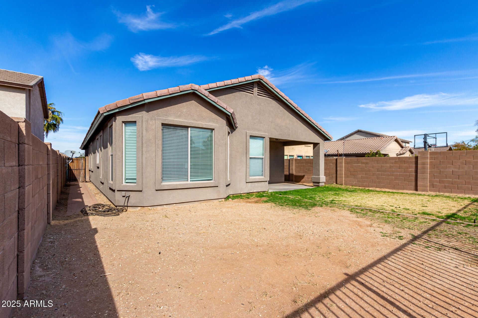 3129 West Fremont Rd. Phoenix, AZ 85041 - Photo 24 of 30 a view of a house with a patio