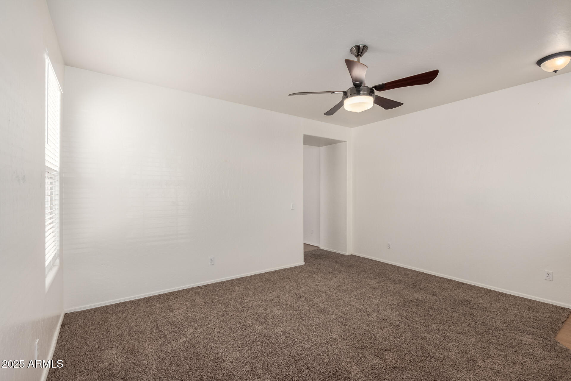 3129 West Fremont Rd. Phoenix, AZ 85041 - Photo 10 of 30 a view of an empty room