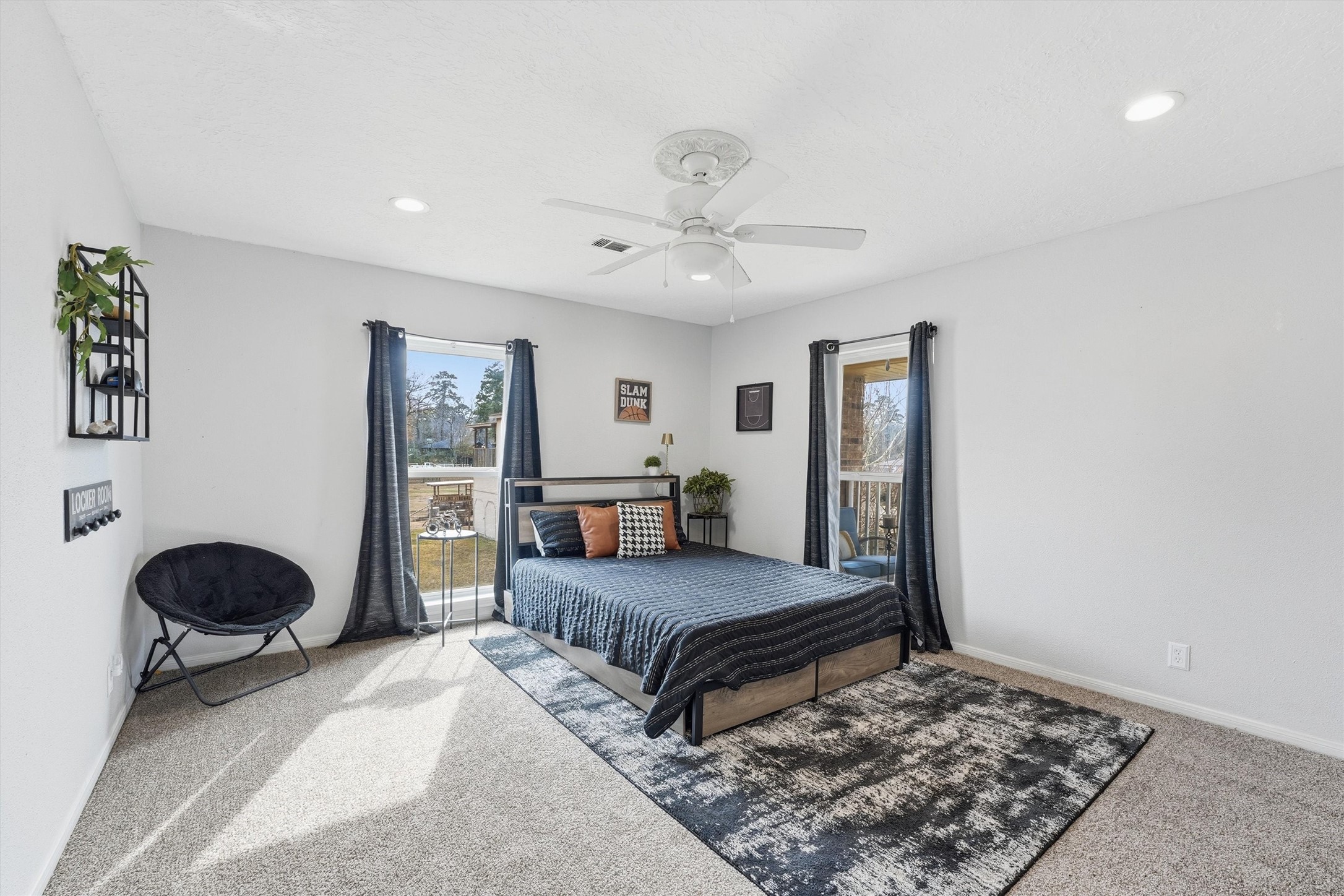 17663 Gardenia Lane New Caney, TX 77357 - Photo 17 of 37 a bedroom with a bed and window