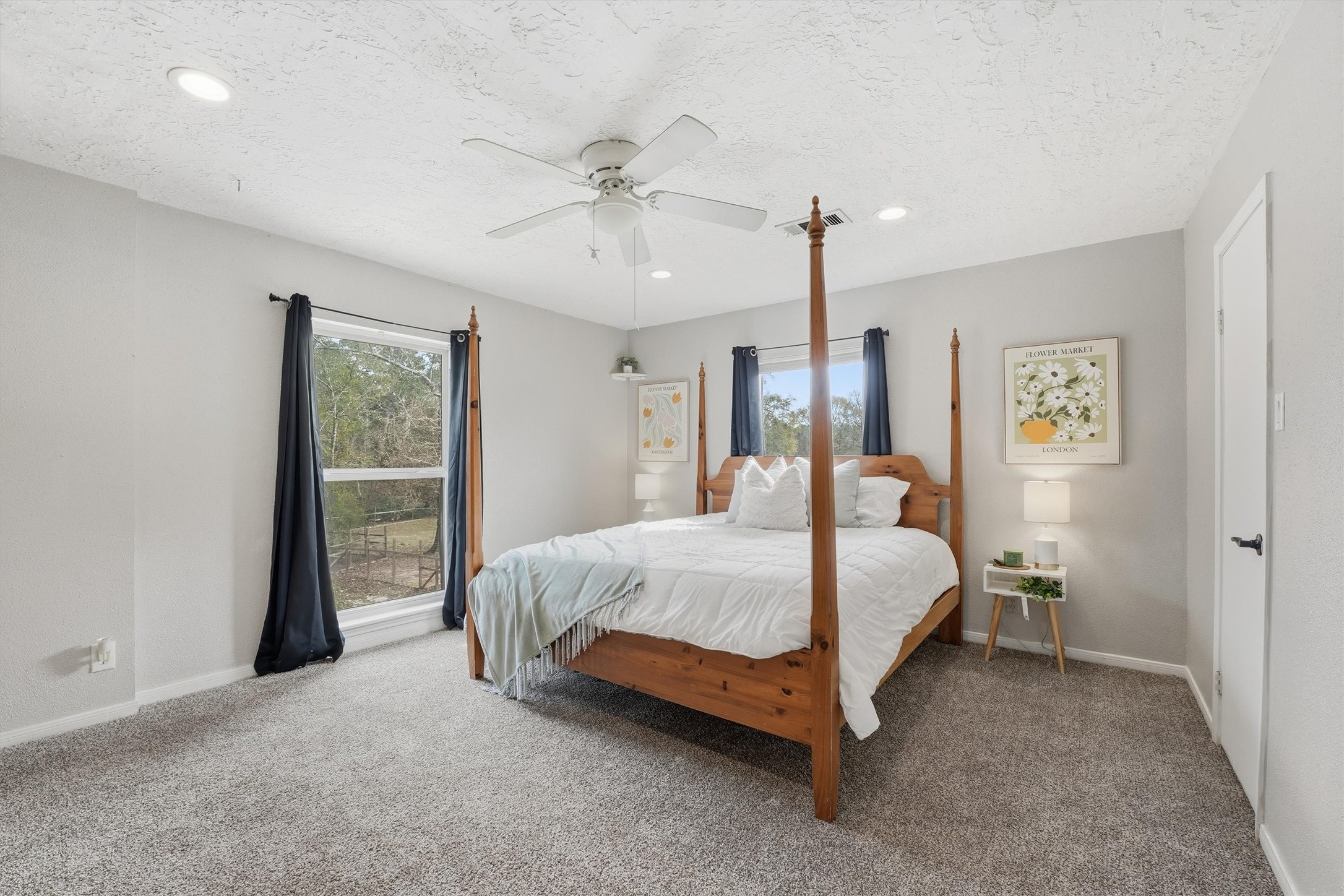 17663 Gardenia Lane New Caney, TX 77357 - Photo 18 of 37 a bed room with a bed and a window