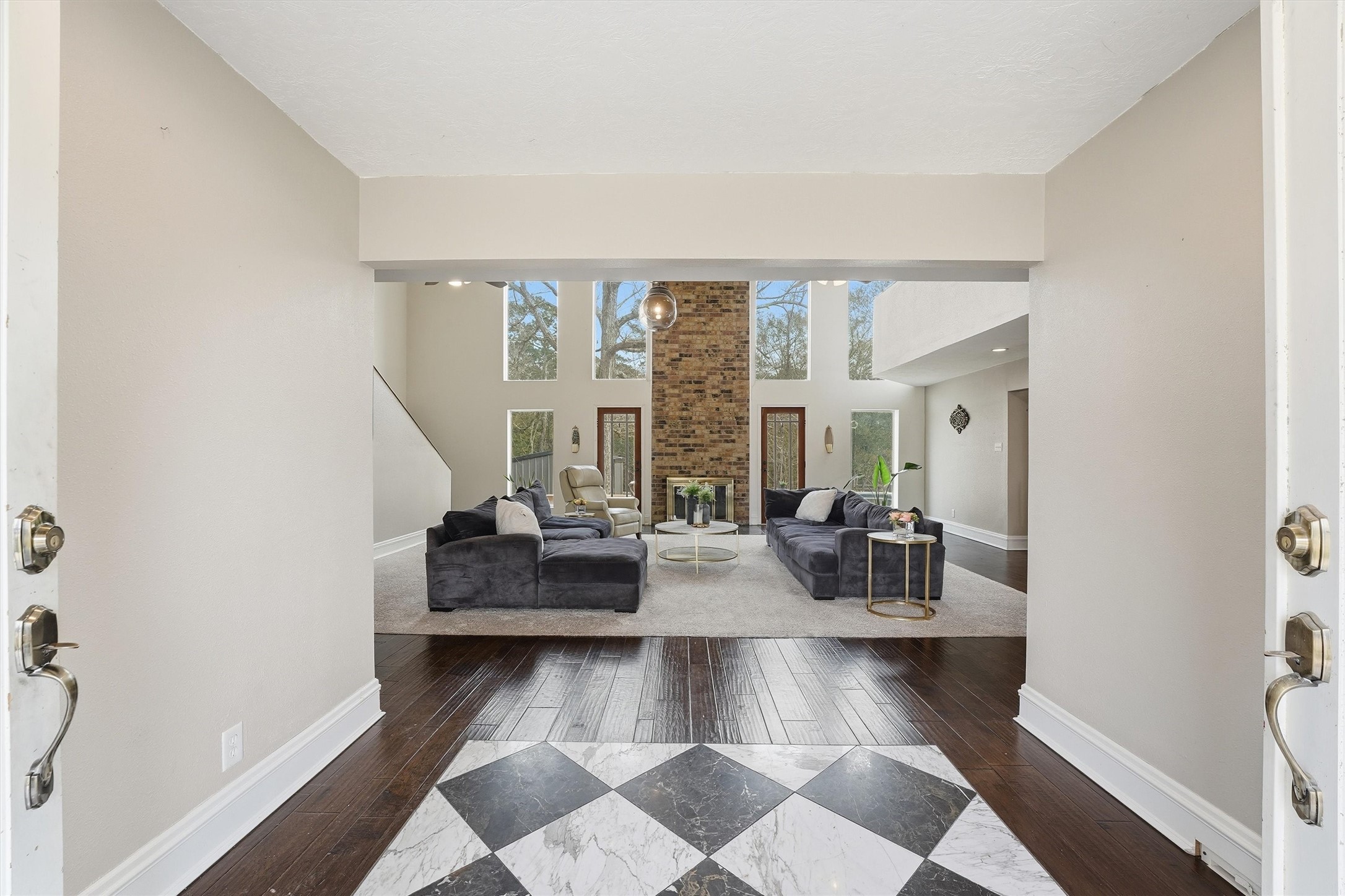 17663 Gardenia Lane New Caney, TX 77357 - Photo 2 of 37 a living room with furniture and a large window