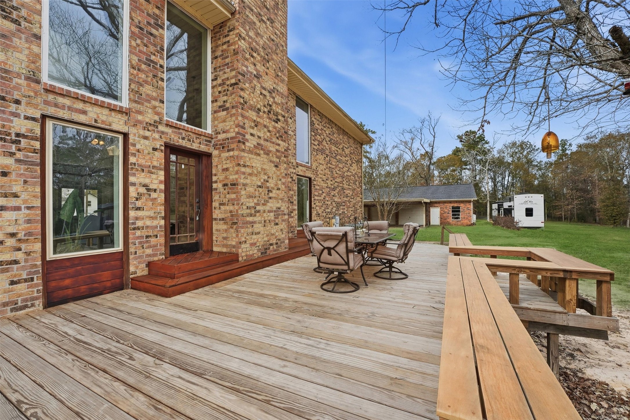 17663 Gardenia Lane New Caney, TX 77357 - Photo 22 of 37 a view of a house with patio outdoor seating