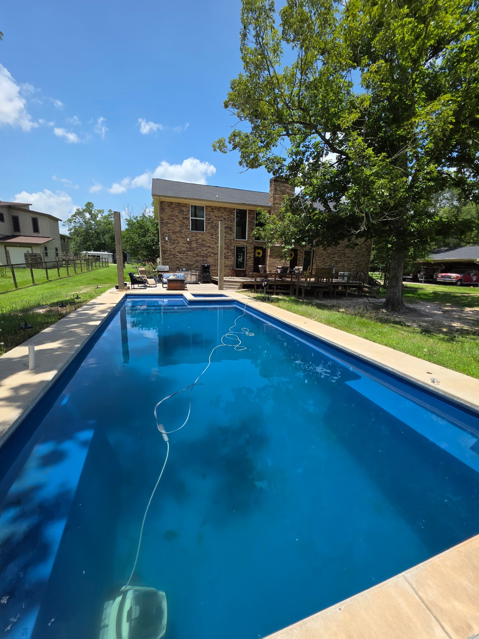 17663 Gardenia Lane New Caney, TX 77357 - Photo 23 of 37 a view of a house with pool