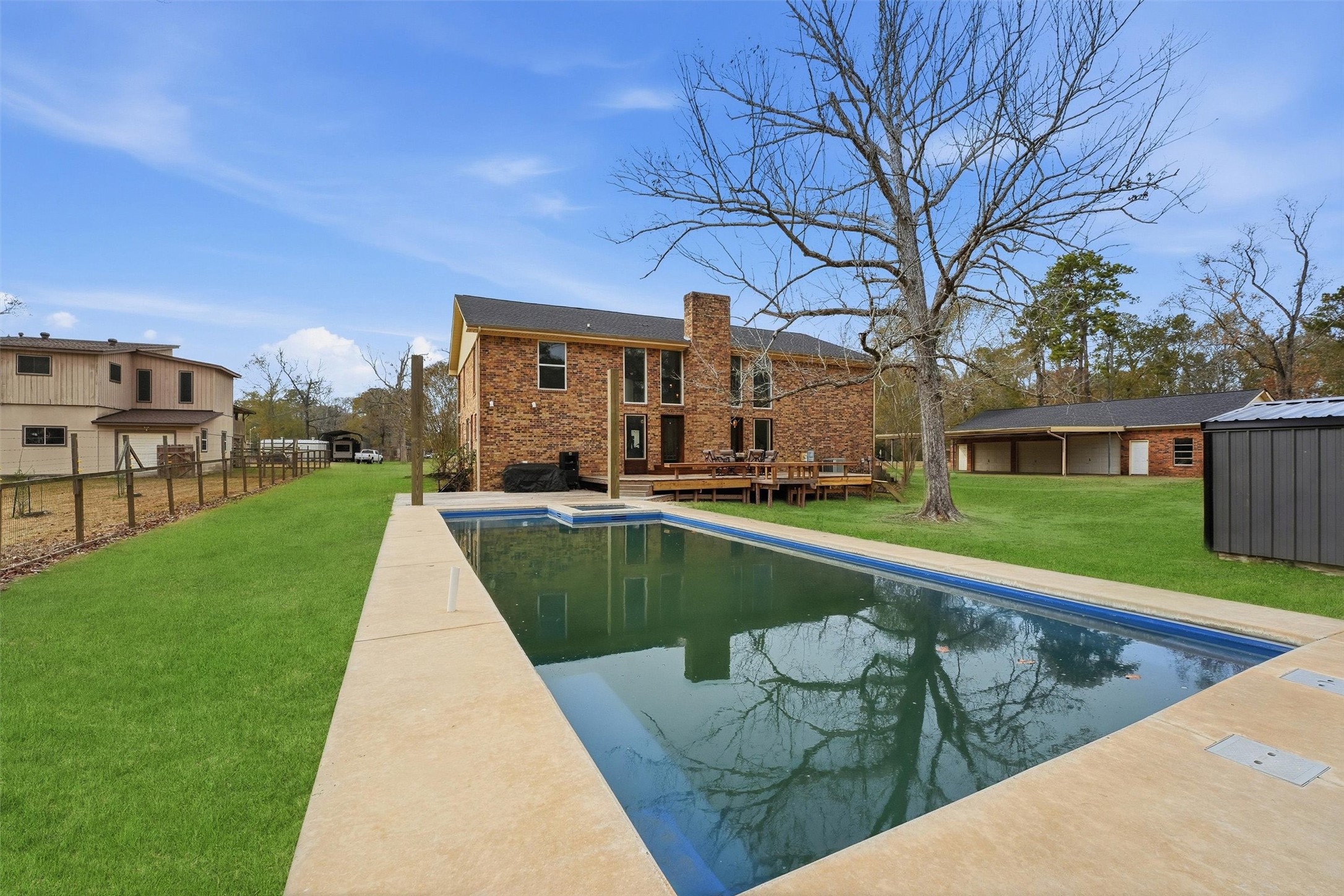 17663 Gardenia Lane New Caney, TX 77357 - Photo 25 of 37 a view of a house with a yard
