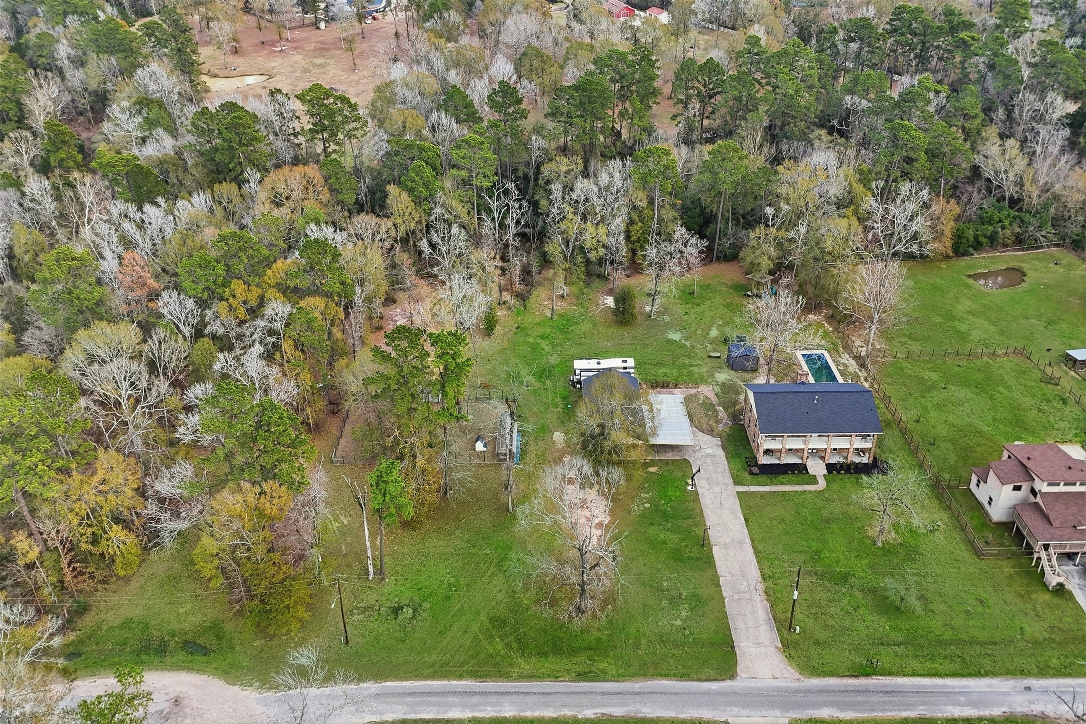 17663 Gardenia Lane New Caney, TX 77357 - Photo 28 of 37 an aerial view of a house
