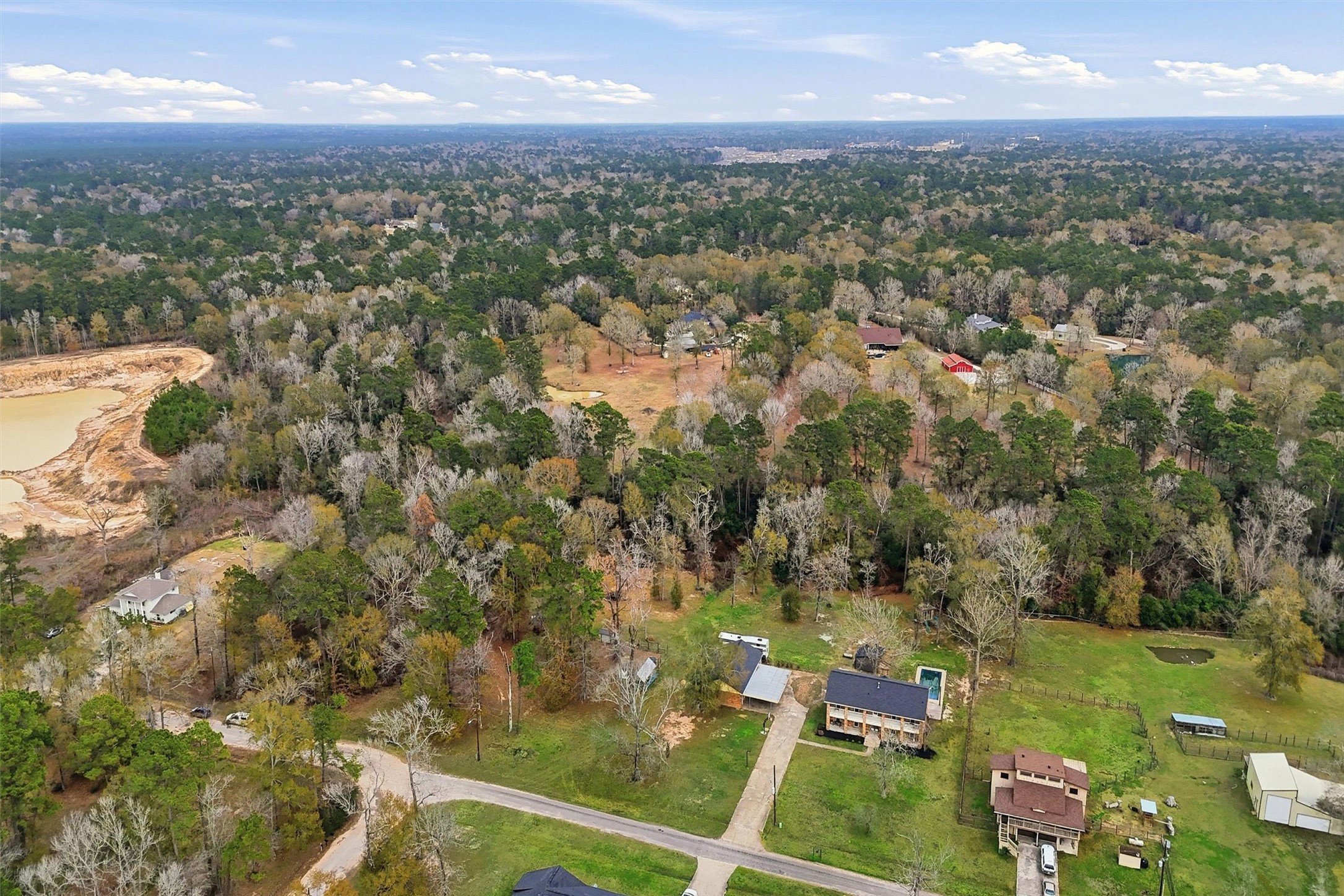 17663 Gardenia Lane New Caney, TX 77357 - Photo 31 of 37 an aerial view of residential houses with outdoor space