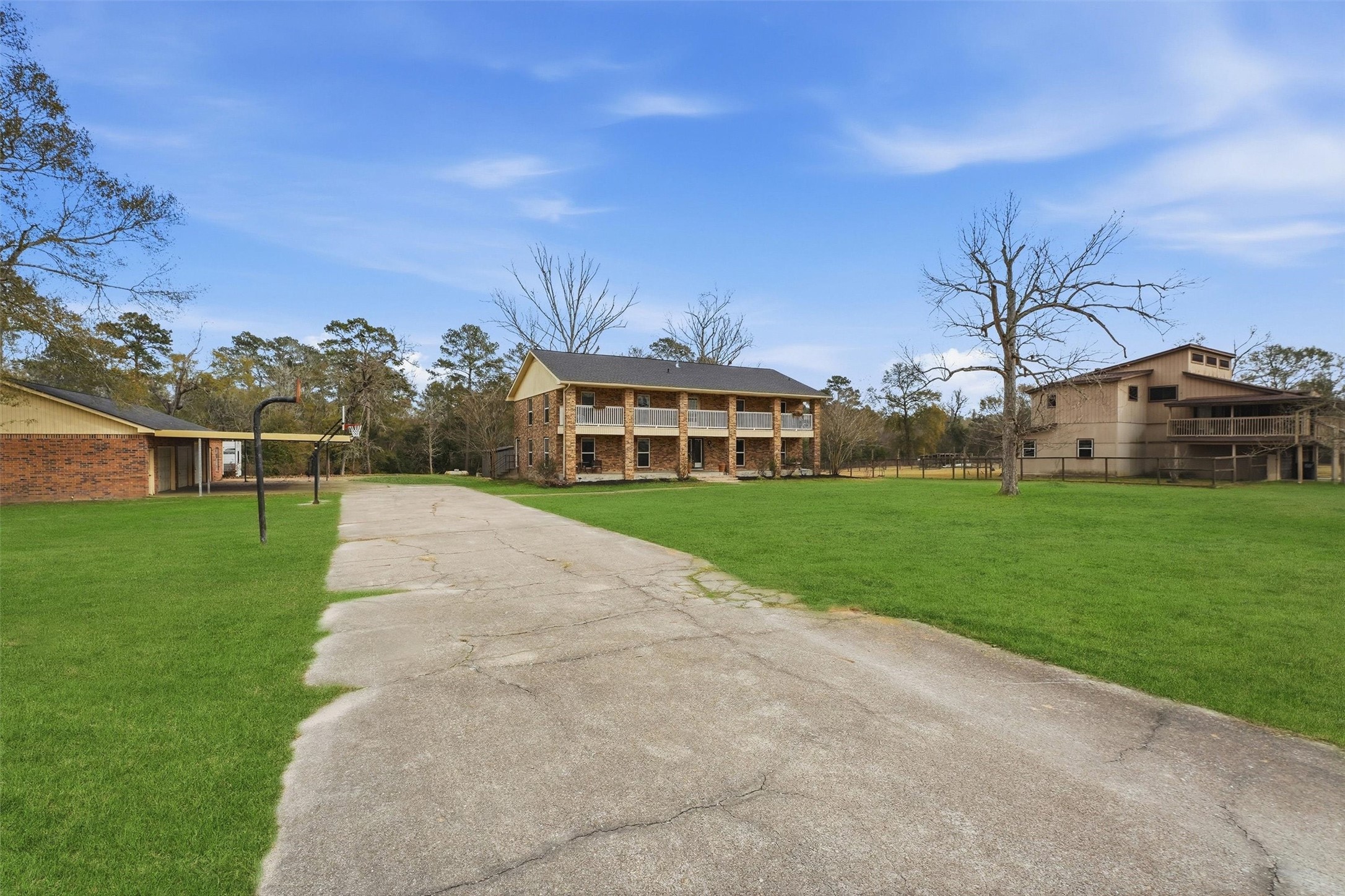 17663 Gardenia Lane New Caney, TX 77357 - Photo 33 of 37 a front view of house with yard and green space