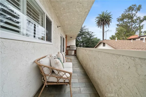 a view of balcony with outdoor seating