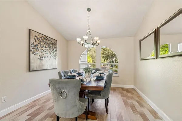 a bathroom with a double vanity sink mirror and shower