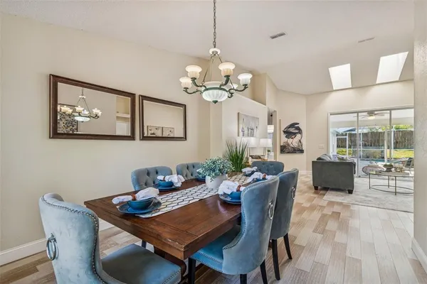 a bathroom with a shower sink and mirror