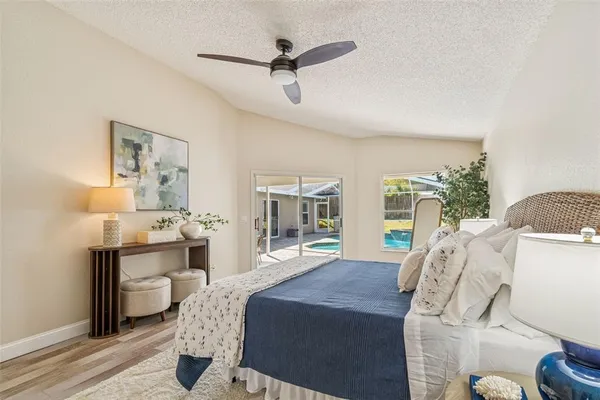 a kitchen with granite countertop a stove a sink and dishwasher wooden cabinets with granite countertops