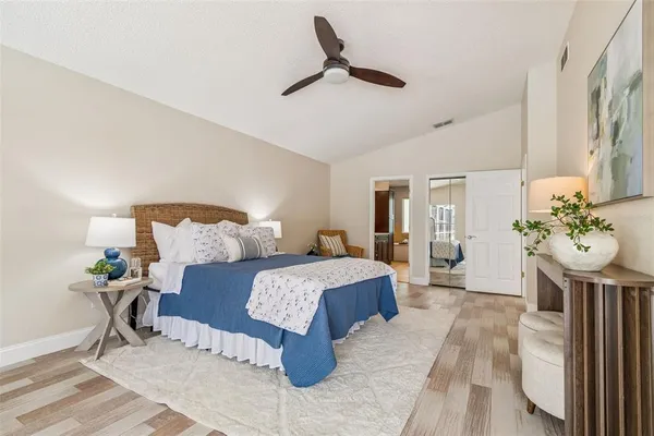 a kitchen with a sink cabinets and window