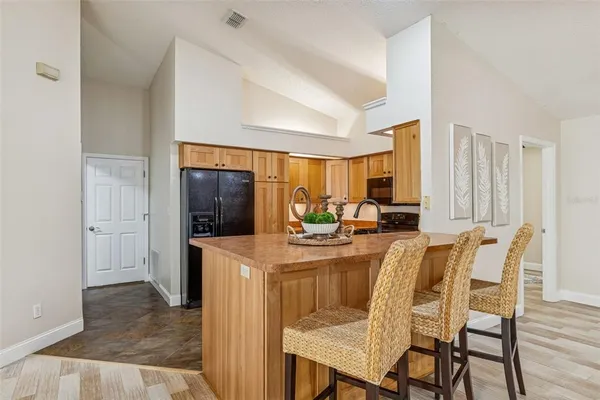 a bathroom with a shower curtain and a curtain