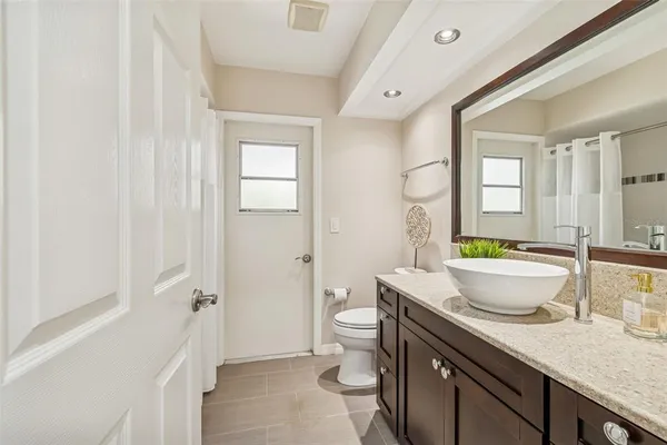 a view of a hallway with washer and dryer