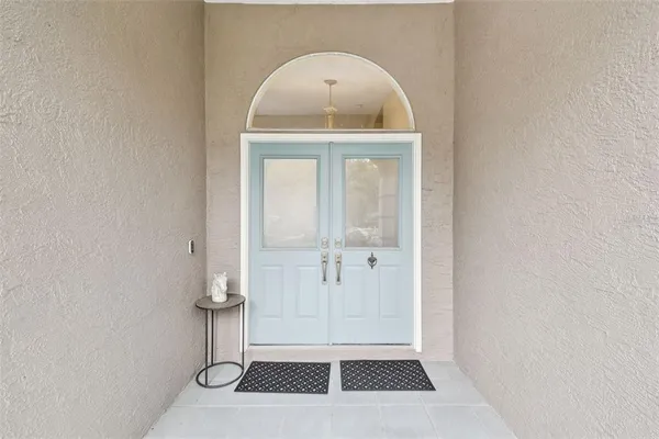 a living room with furniture and a couch