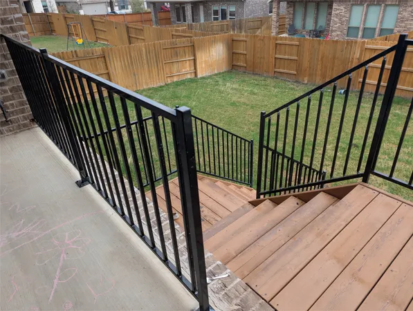 a view of balcony with wooden floor