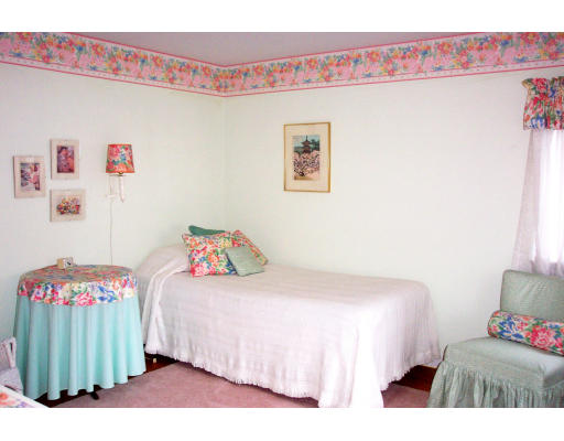 24 Longfellow Road Needham, MA 02494 - Photo 5 of 10 a bedroom with a bed and a couch