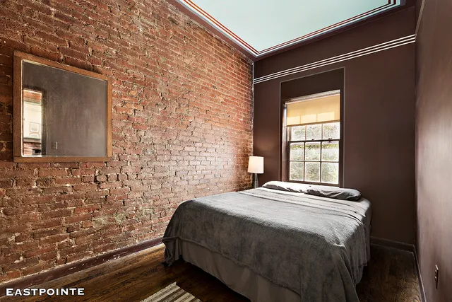 a kitchen that has a refrigerator a stove top oven a sink and dishwasher
