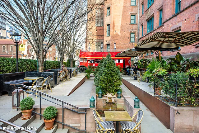 a view of brick building with a large window