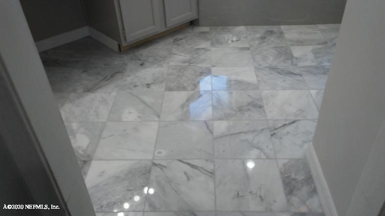 1780 Denmark Drive Fleming Island, FL 32003 - Photo 14 of 25 a bathroom with a shower